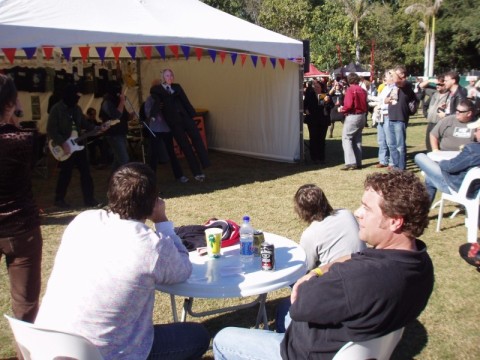 People watching The Black Assassins play in front of the 4ZZZ tent at Pig City , Brisbane July 2007